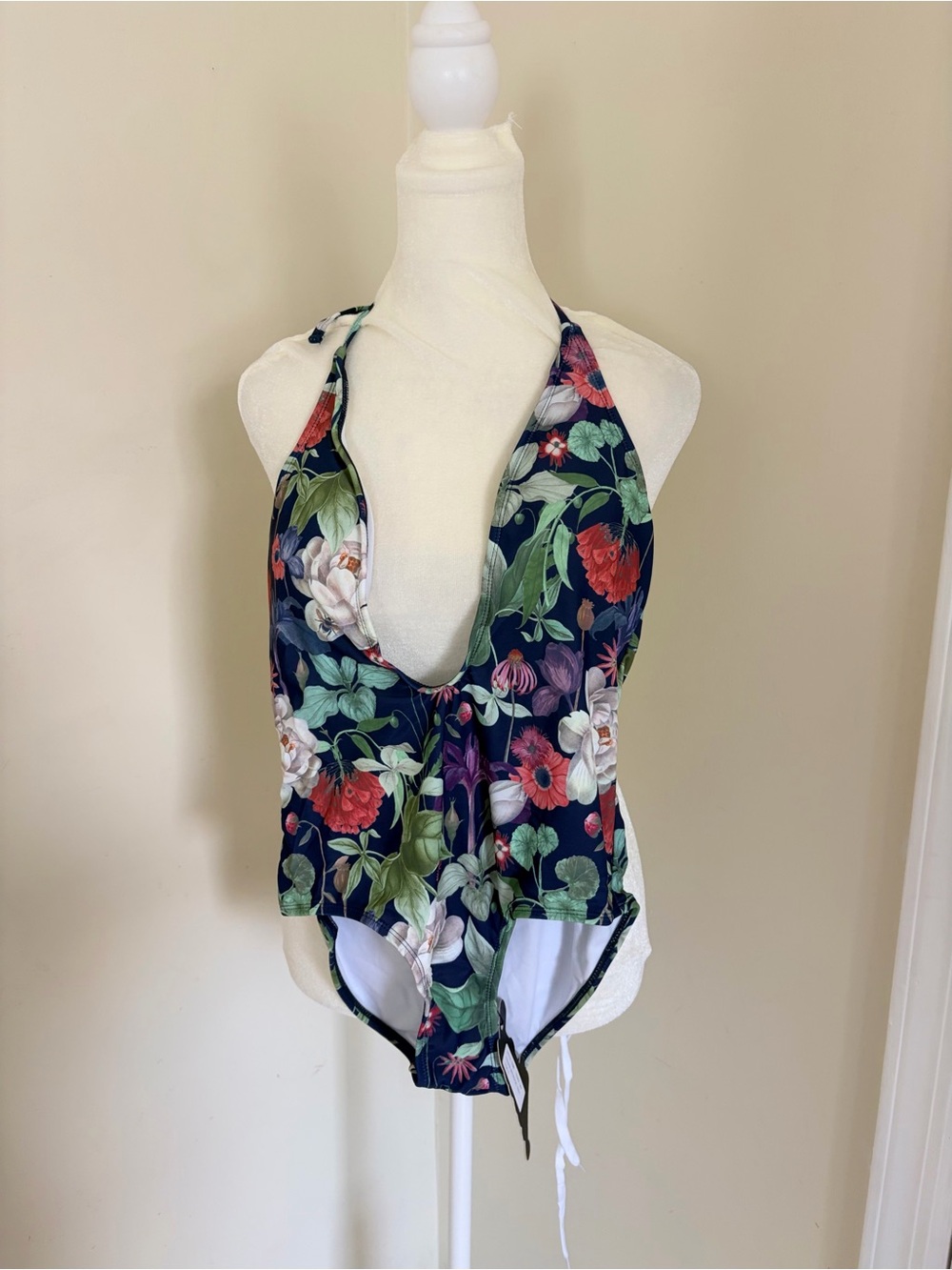 NWT Motel Sunny Day one-piece swimsuit featuring a botanical navy floral print a